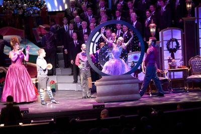 Madam Drosselmeyer (Shawn D. Ingram) present Clarence (Lee Pitts) with a ballerina (M Photo