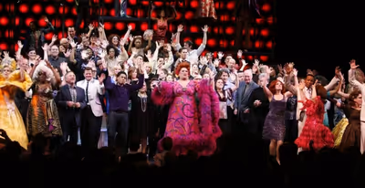 Harvey Fierstein & Marissa Jaret Winokur( with Ensemble casts Past & Present ) during Photo