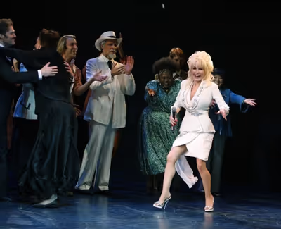 Dolly Parton during the Broadway Opening Night Performance Curtain Call for " 9 to 5  Photo