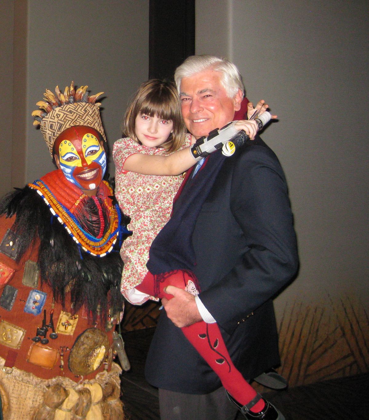Tshidi Manye (Rafiki), Senator Chris Dodd, and daughter Grace at 