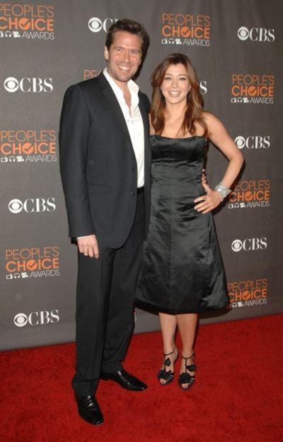 Alyson Hannigan and husband Alexis Denisof Photo