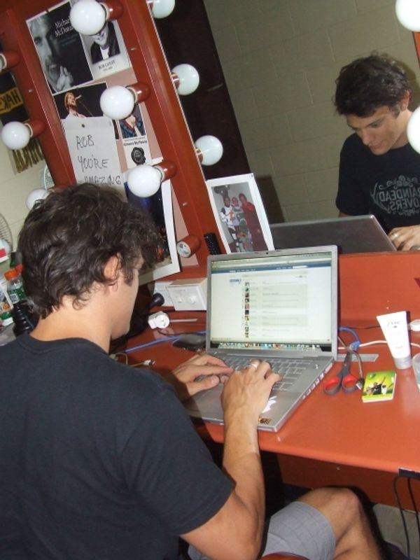 Rob Mills Checks his Facebook in his Dressing Room Photo