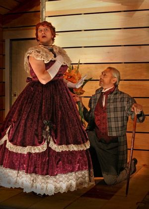 Papa Leroux proposes to Widow Tillou: Equity actor Nicholas Koesters* (standing) as W Photo