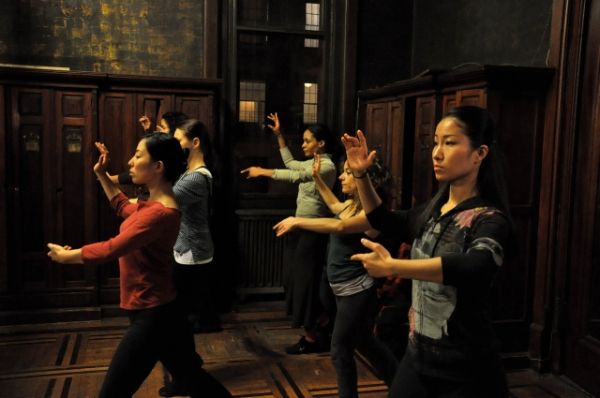 Women practice a tango move. Left: Alexandria Wailes, Ana Grosse and Itsuko Higashi R Photo