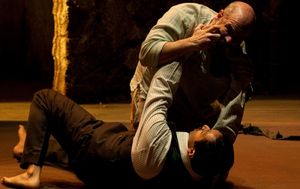 Yusef (Demosthenes Chrysan, on top) and his enterprising young nephew Tariq (Bhavesh Patel, on the ground) fight over a difference of opinion while being held in prison. @ BroadwayWorld Yusef (Demosthenes Chrysan, on top) and his enterprising young nephew Tariq (Bhavesh Photo