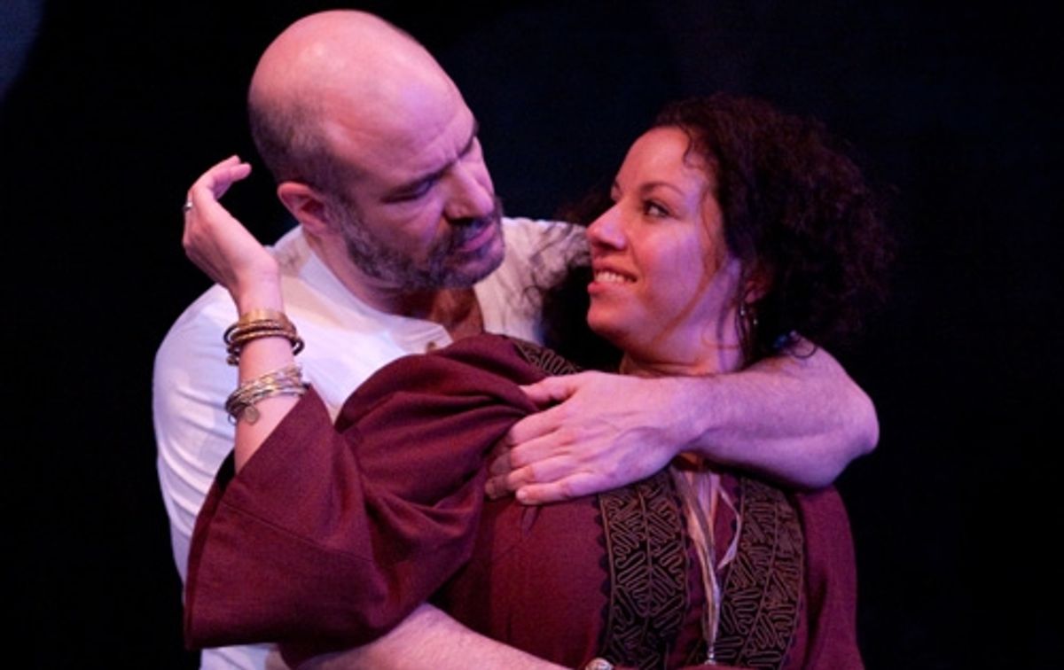 Yusef (Demosthenes Chrysan) and his wife Ambara (Suehyla El-Attar) share a moment together. at 