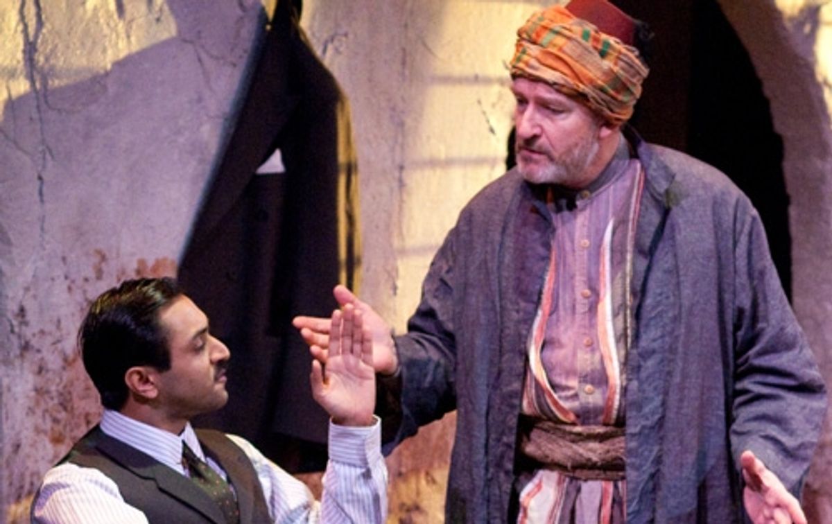 The enterprising young nephew Tariq (Bhavesh Patel) discusses the crisis in Palestine with Hajj Waleed (Tom Thon). at 