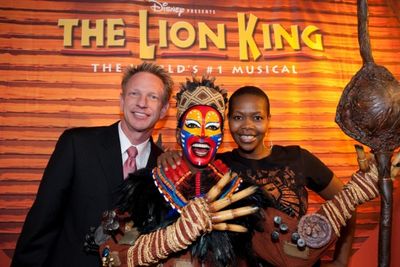 VP of Marketing at Mandalay Bay Lynn Holt, Rafiki Wax Figure and Buyi Zama Photo