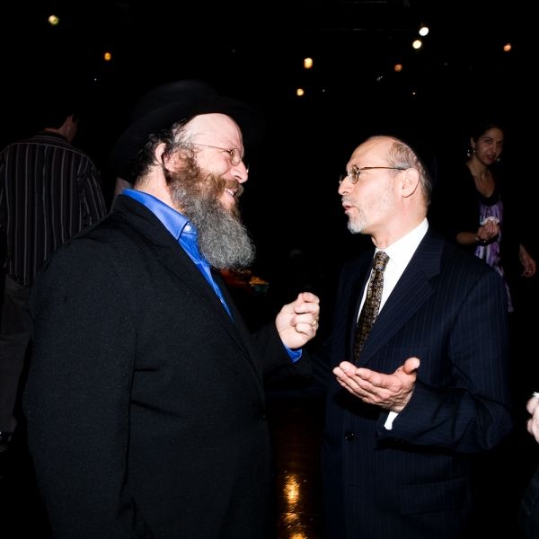 Yisrael Campbell with Mohel Rabbi Yehoshua Krohn  Photo
