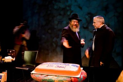 Yisrael Campbell kibitzes with Mohel Dr. Harvey Marchbein Photo