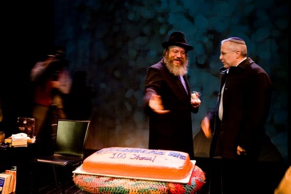 Yisrael Campbell kibitzes with Mohel Dr. Harvey Marchbein Photo