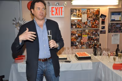 Kevin McCollum makes a toast Photo