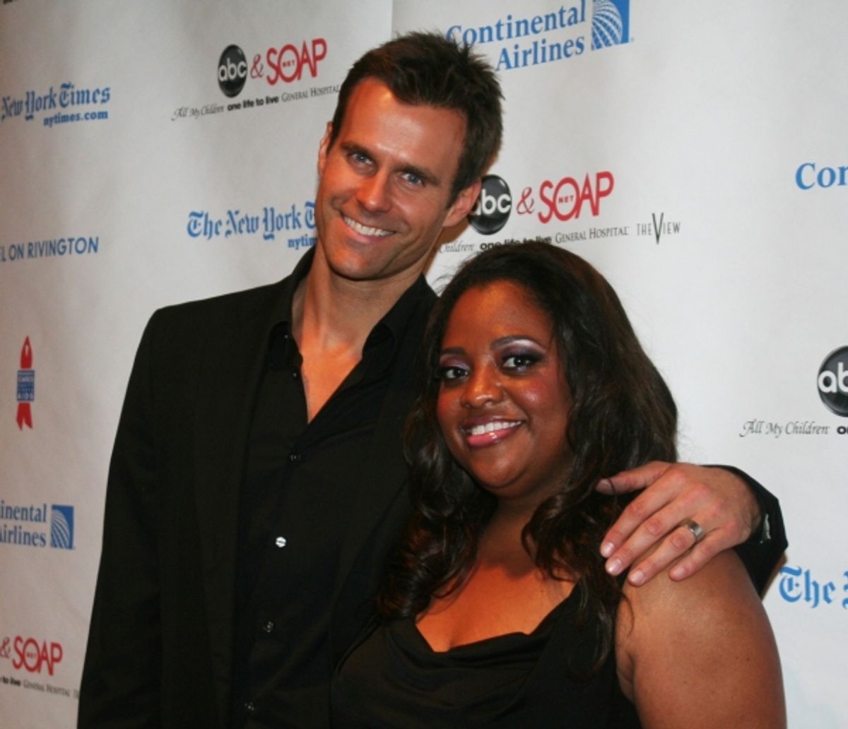 Host Cameron Mathison and Sherri Shepard at 