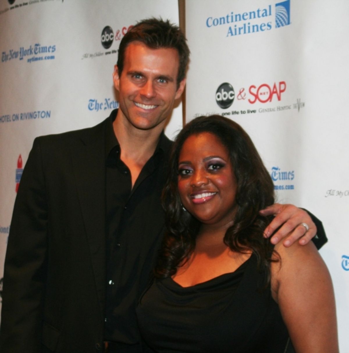 Host Cameron Mathison and Sherri Shepard at 