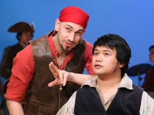 James Anthony Zoccoli as Long John Silver and Kroydell Galima as Jim Hawkins Photo