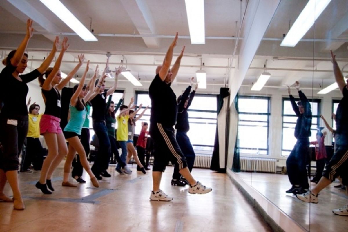 Trent Kowalik and Thommie Retter practice the dance from the Billy Elliot finale with the students at 