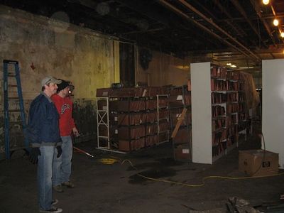 Josh Kessler, Andy Batt survey the previous owner's files Photo