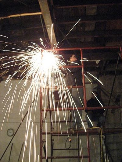 Andy Batt grinds through a gas pipe (scary!) Photo
