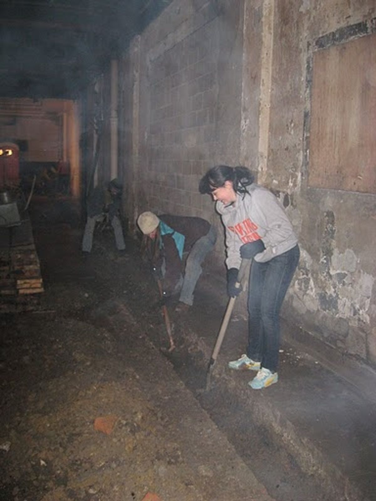 Tay Lane, Erin Prosser dig a trench for underground pipes at 