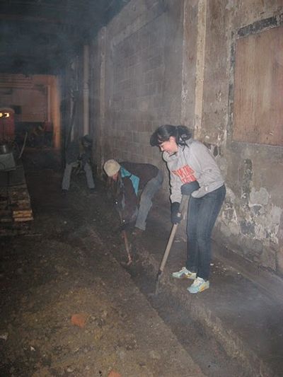 Tay Lane, Erin Prosser dig a trench for underground pipes Photo