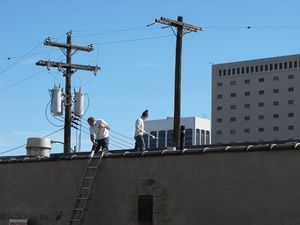 Brian Barlup, David Thonnings work to seal the roof leaks @ BroadwayWorld Brian Barlup, David Thonnings work to seal the roof leaks Photo