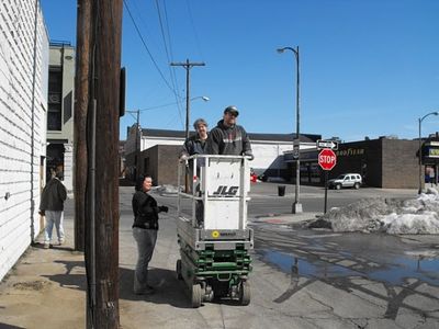 Andy Batt, Josh Kessler take a ride to put AC units on roof Photo