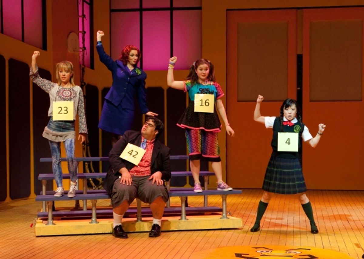 Devon Meddock (Olive Ostrovsky), Tricia Bestic* (Rona Lisa Perretti), Kelly Smith (Logainne Schwartzandgrubenniere), and Robin Lee Gallo* (Marcy Park); center/sitting, Patrick Ciamacco (William Barfee) at 