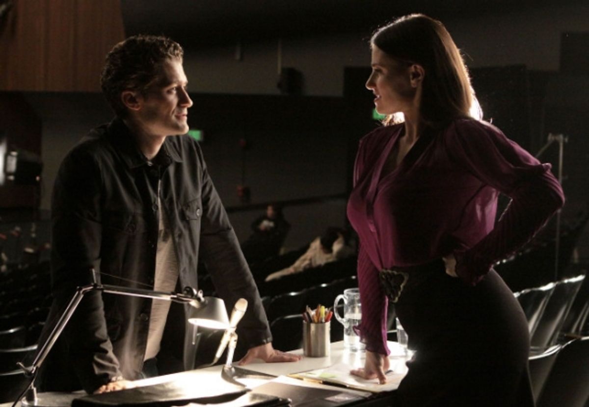 Will (Matthew Morrison) meets Shelby (guest star Idina Menzel), the coach of Vocal Adrenaline at 