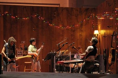 Shelley Doty on lead guitar, Jean DuSablon on bass, Ieela Grant on drums and Julie Wo Photo