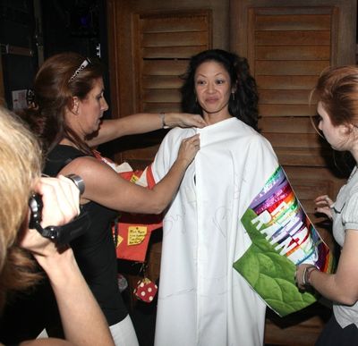 Kristine Bendul Getting Robed by AEA VP Rebecca Kim Jordan Photo