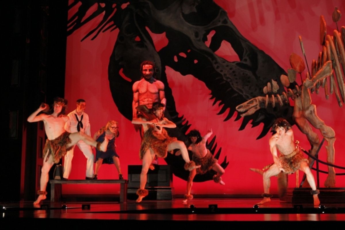 Sailor Ozzie (Greg McCormick Allen, left) and Anthropologist Claire (Bille Wildrick, left) get in touch with their primitive side along with a quartet of dancing cavemen at 