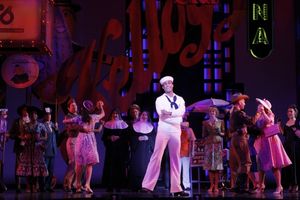 When you're waiting for a date with the most beautiful girl in the world, everyone seems to be in on your romance, as Sailor Gabey (Joe Aaron Reid, center) learns @ BroadwayWorld When you're waiting for a date with the most beautiful girl in the world, everyone se Photo