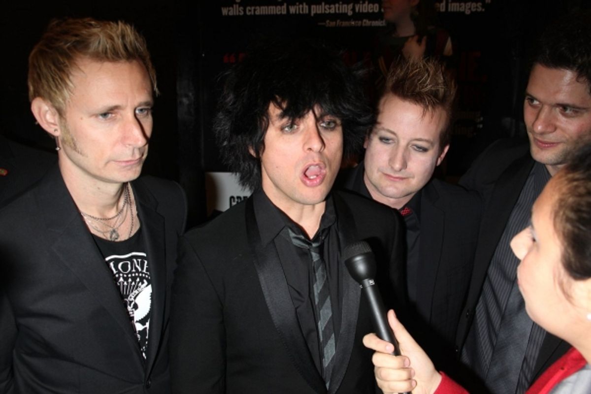 Mike Dirnt, Billie Joe Armstrong, Tre Cool of Green Day and Tom Kitt at 