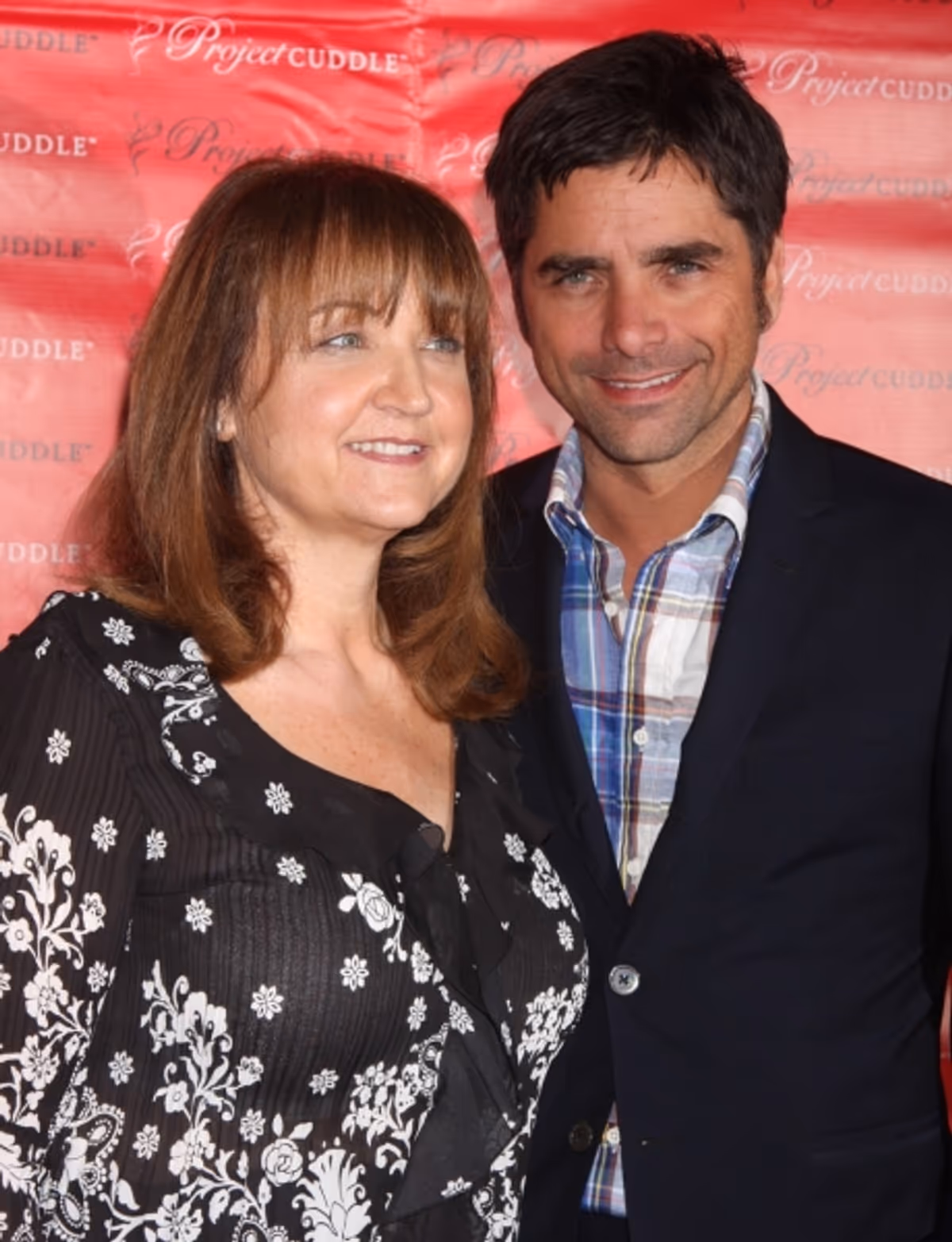 Debbie Magnusen and John Stamos at 