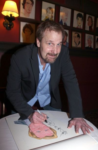 Jeff Daniels Signs his Portrait Photo