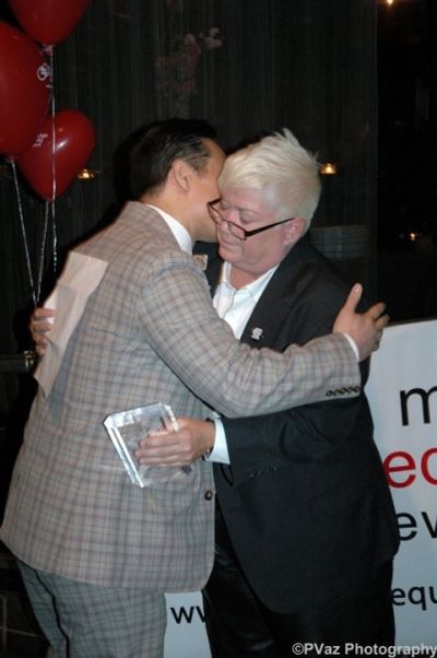 BD Wong receives his award from Lea DeLaria  Photo