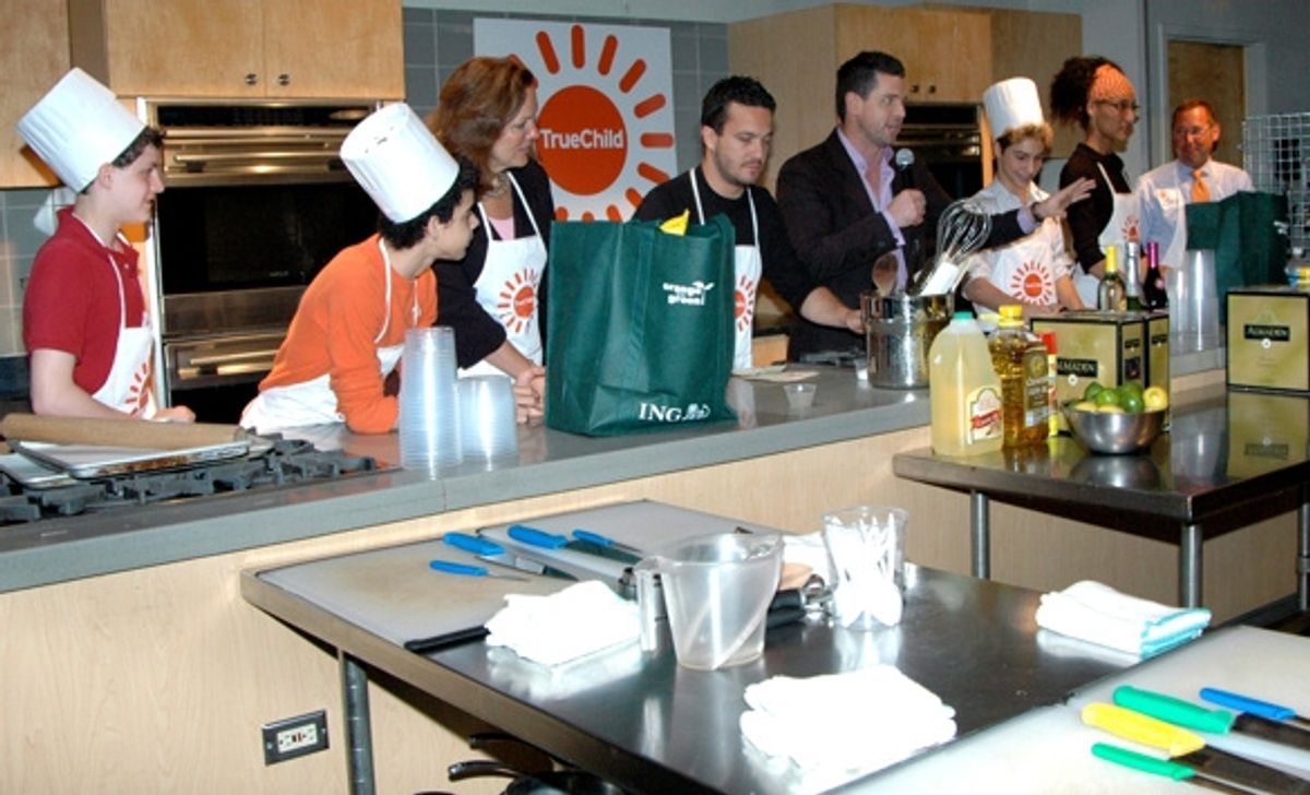 The teams get ready to start-Trent Kowalik, David Alvarez, Bridget Healey, and Fabio Viviani are Team A, Ryan Scott is host and Team B is Kiril Kulish, Carla Hall, and Chip Wheeler at 