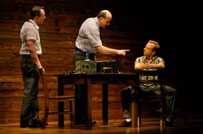 FBI agents Paul (John Hoogenakker) and Steve (Mick Weber) interrogate Rowe (Dan Walle Photo