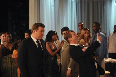 Alec Baldwin as Jack Donaghy, Jack McBryer as Kenneth Parcell Photo