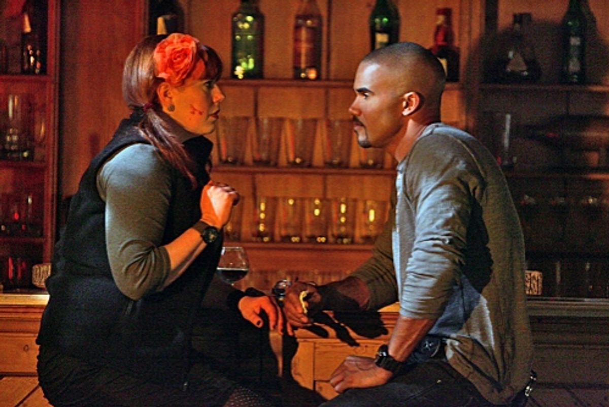 Garcia (Kirsten Vangsness, left) talks with Morgan (Shemar Moore, right) about her role on the BAU team. at 