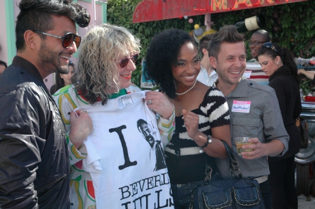 Allee Willis poses with party guests.  at 