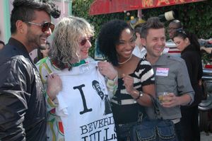 Allee Willis poses with party guests. @ BroadwayWorld Allee Willis poses with party guests. Photo