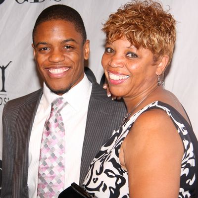 John Michael Hill with mother Yolanda Photo
