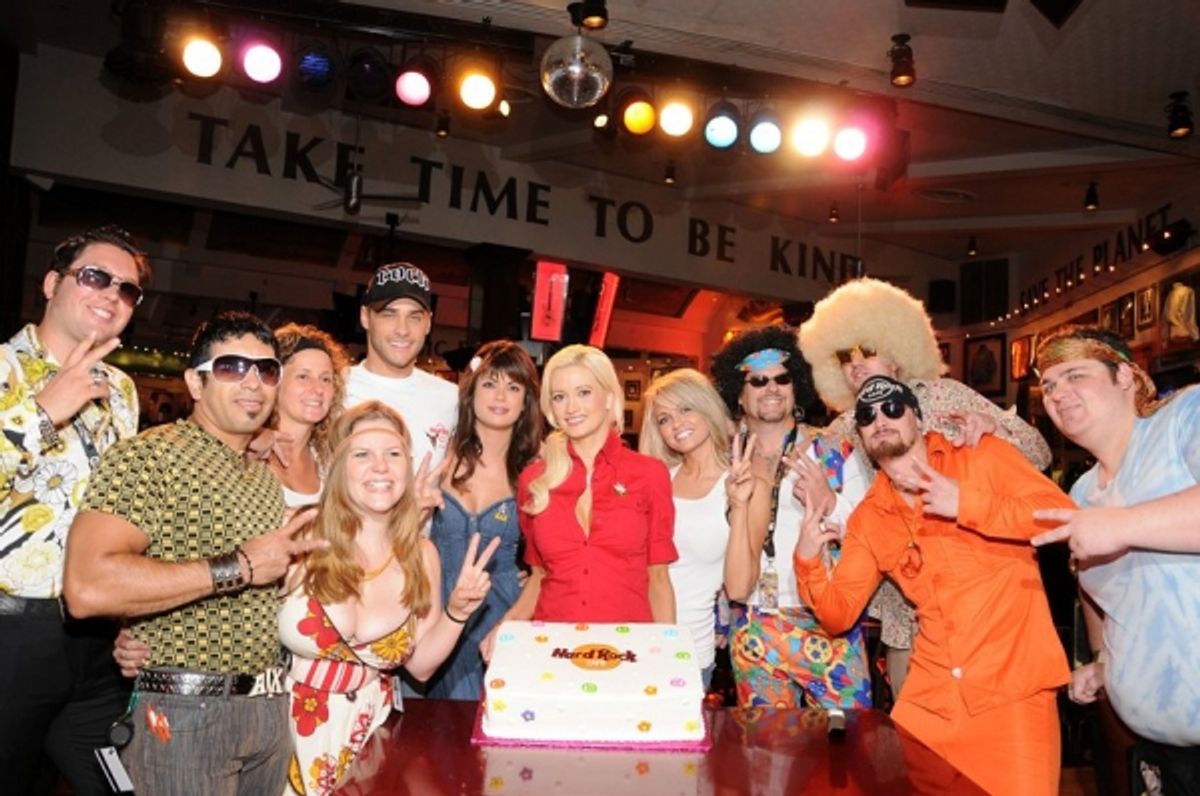 Josh Strickland, Laura Croft, Holly Madison and Angel Porrino with Hard Rock Cafe Staff at 