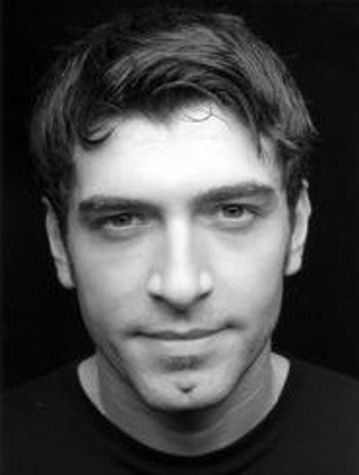 Tam Mutu Headshot