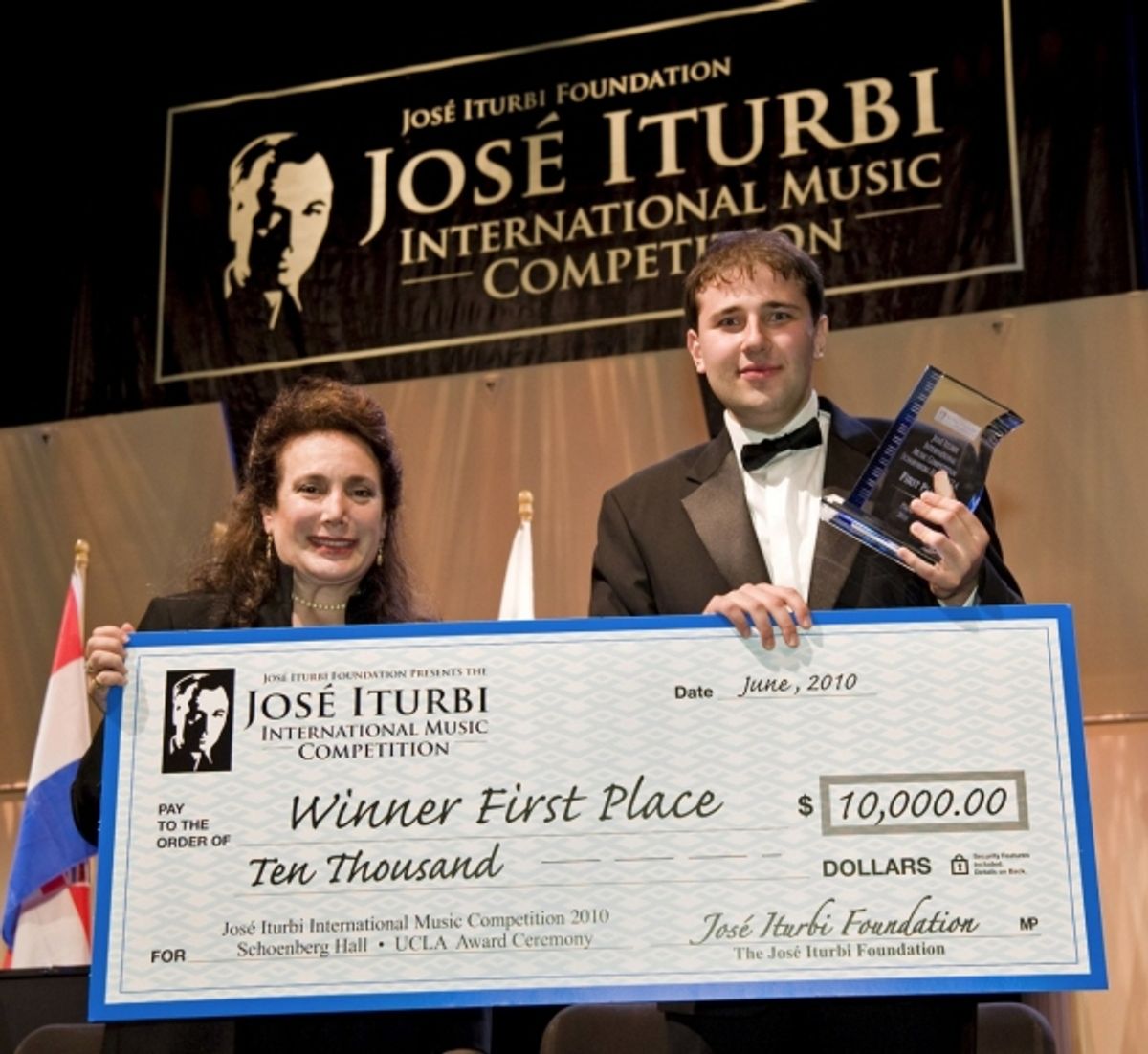Donelle Dadigan Co-Founder & President with the winner of First Prize for piano, Staninslav Kristenko
 at 
