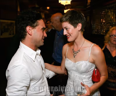 Johnny Galecki (L) and cast member Zoe Perry  Photo