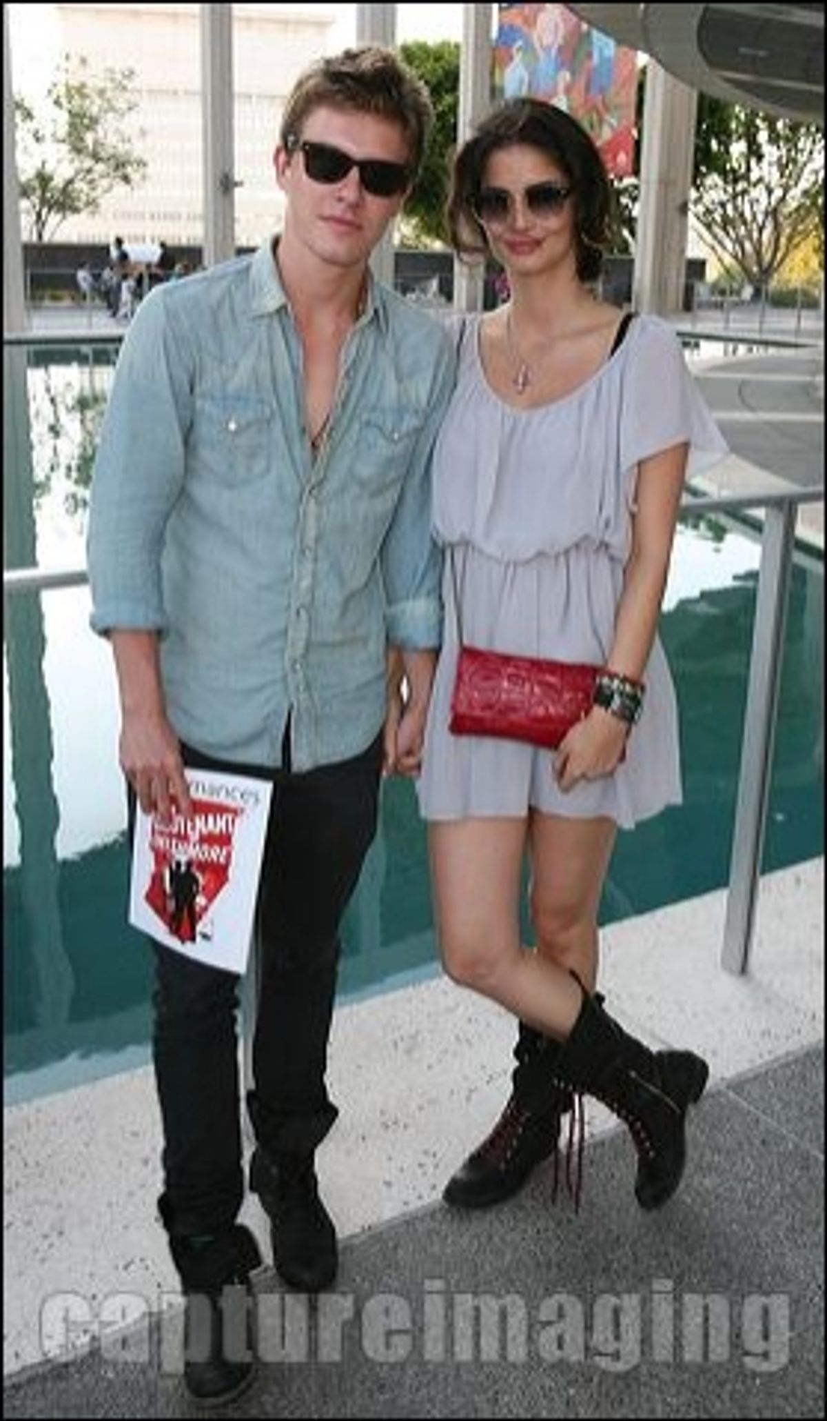 Xavier Samuel (L) and Shermine Sharivar  at 
