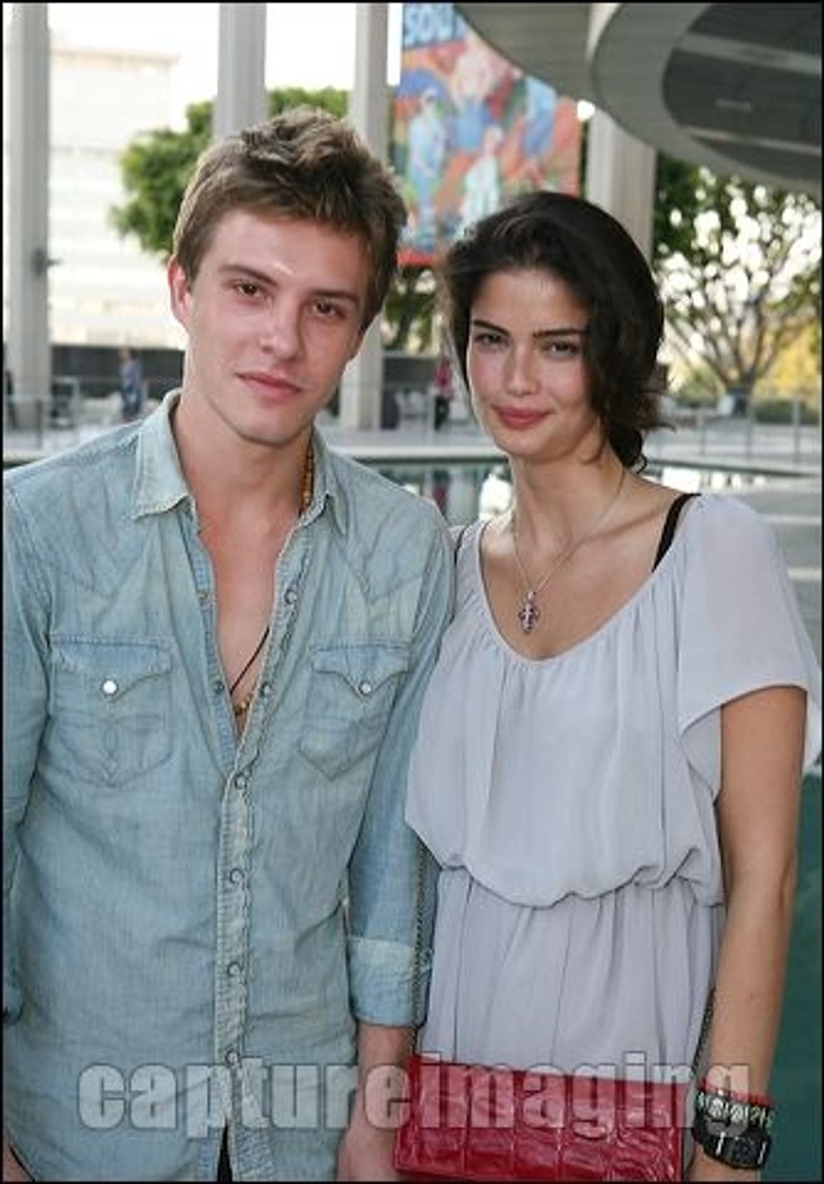 Xavier Samuel (L) and Shermine Sharivar  at 