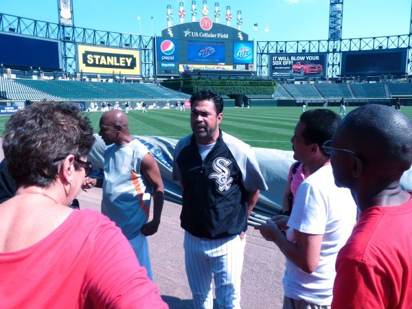 Ozzie Guillen, signs autographs during a meet and greet with Cuba's Teatro BuendÃƒ Photo